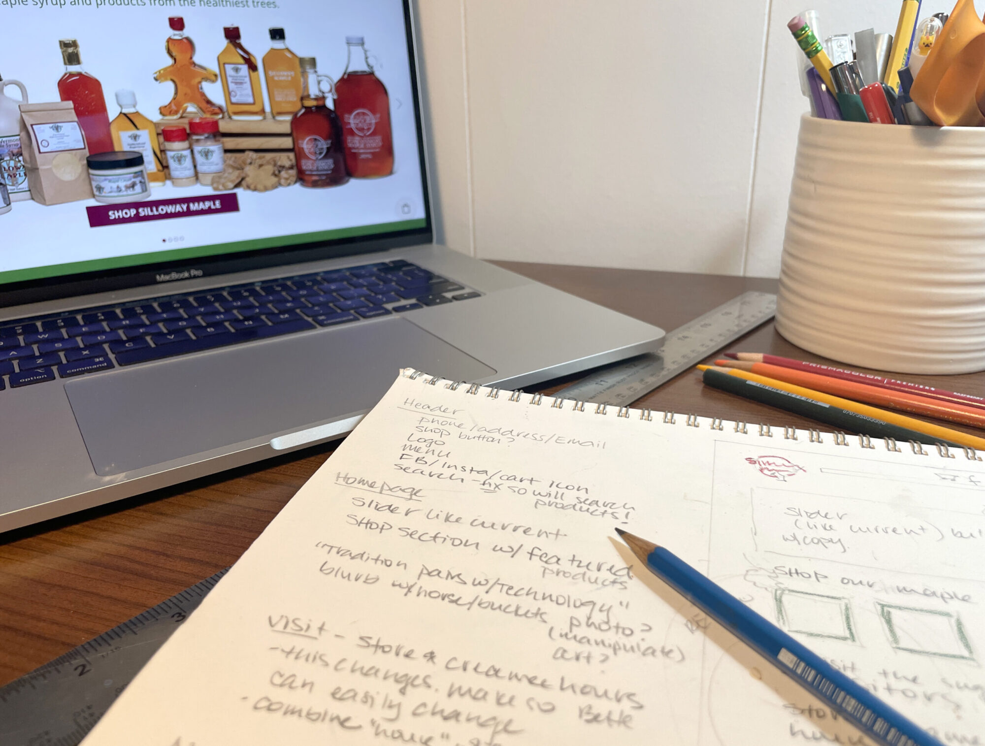 sketch of website being designed in a home office